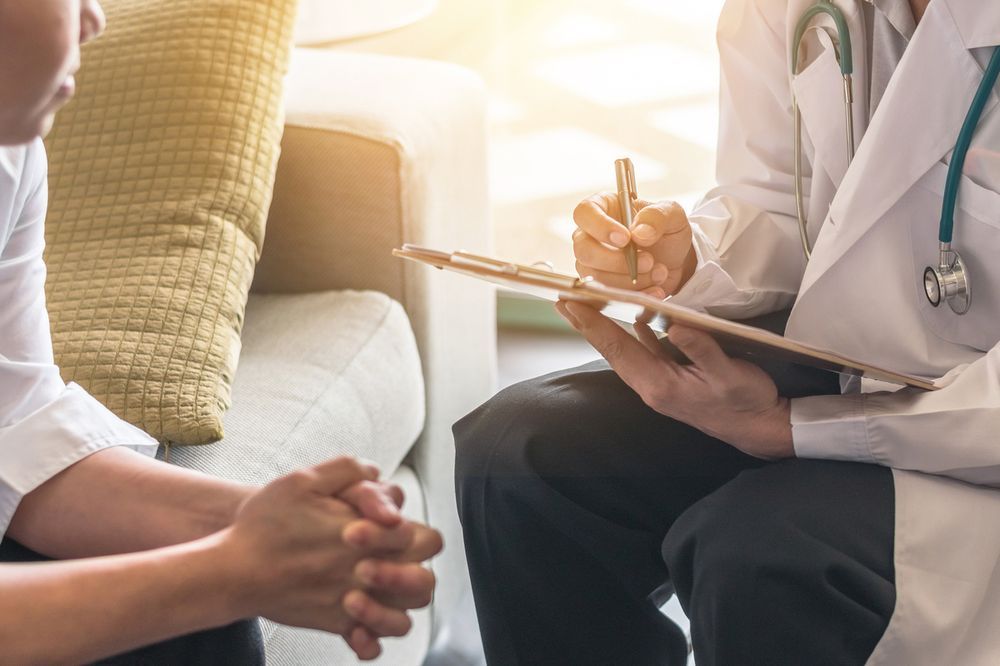 doctor talking to patient